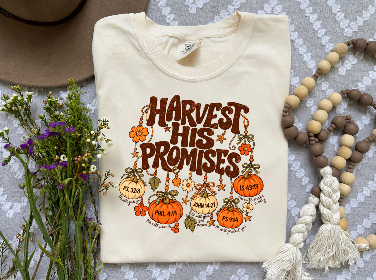Harvest His Promises fall faith graphic with pumpkins and scripture references on a cream tee