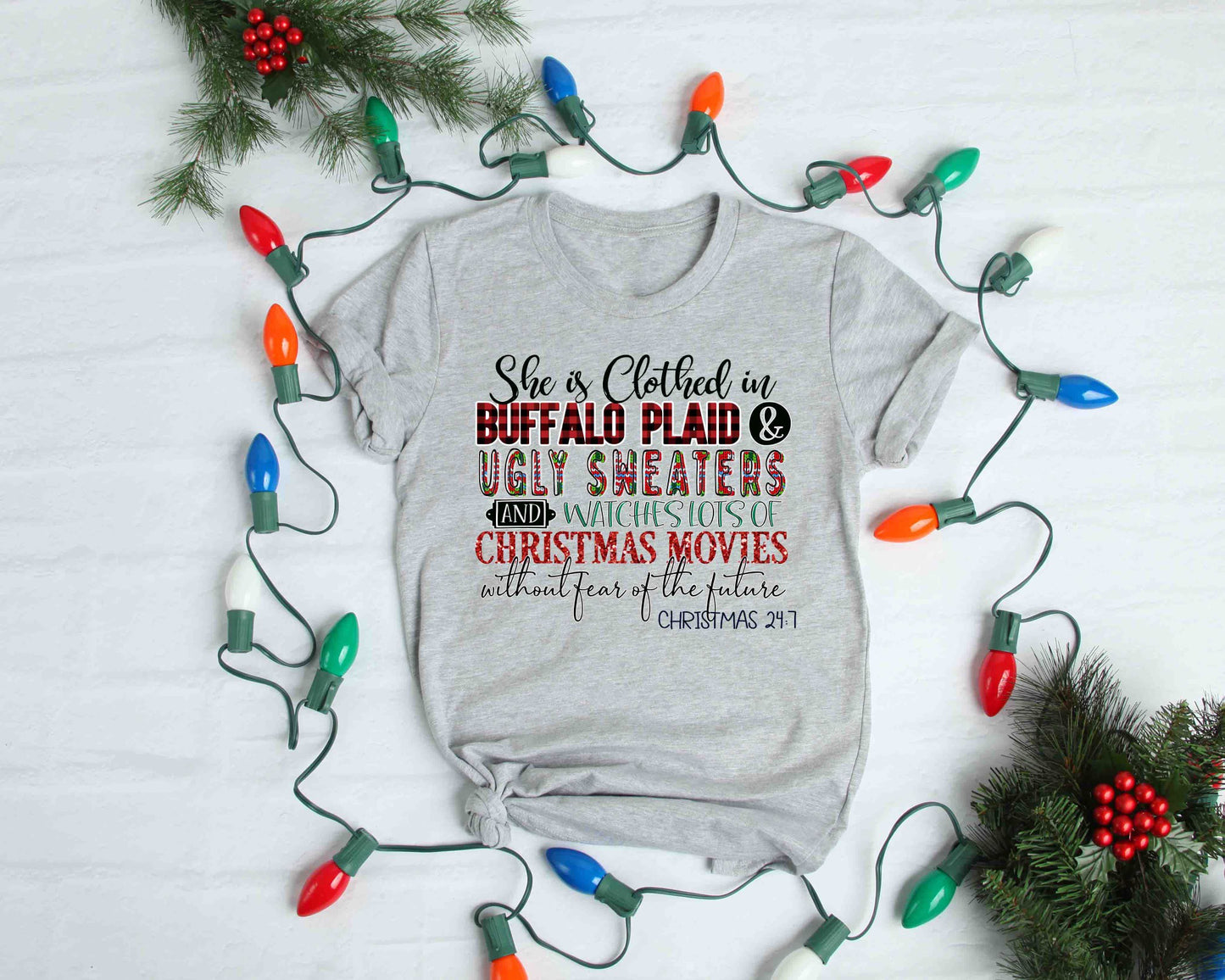 she is clothed in buffalo plaid and ugly sweaters