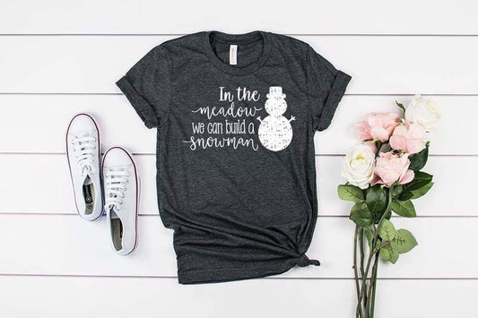 in the meadow we can build a snowman white