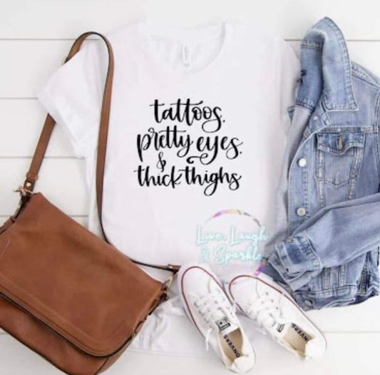 tattoos pretty eyes and thick thighs