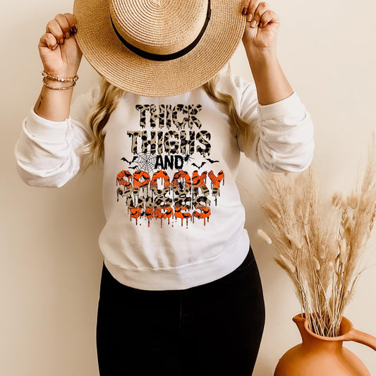 thick thighs and spooky vibes fleece