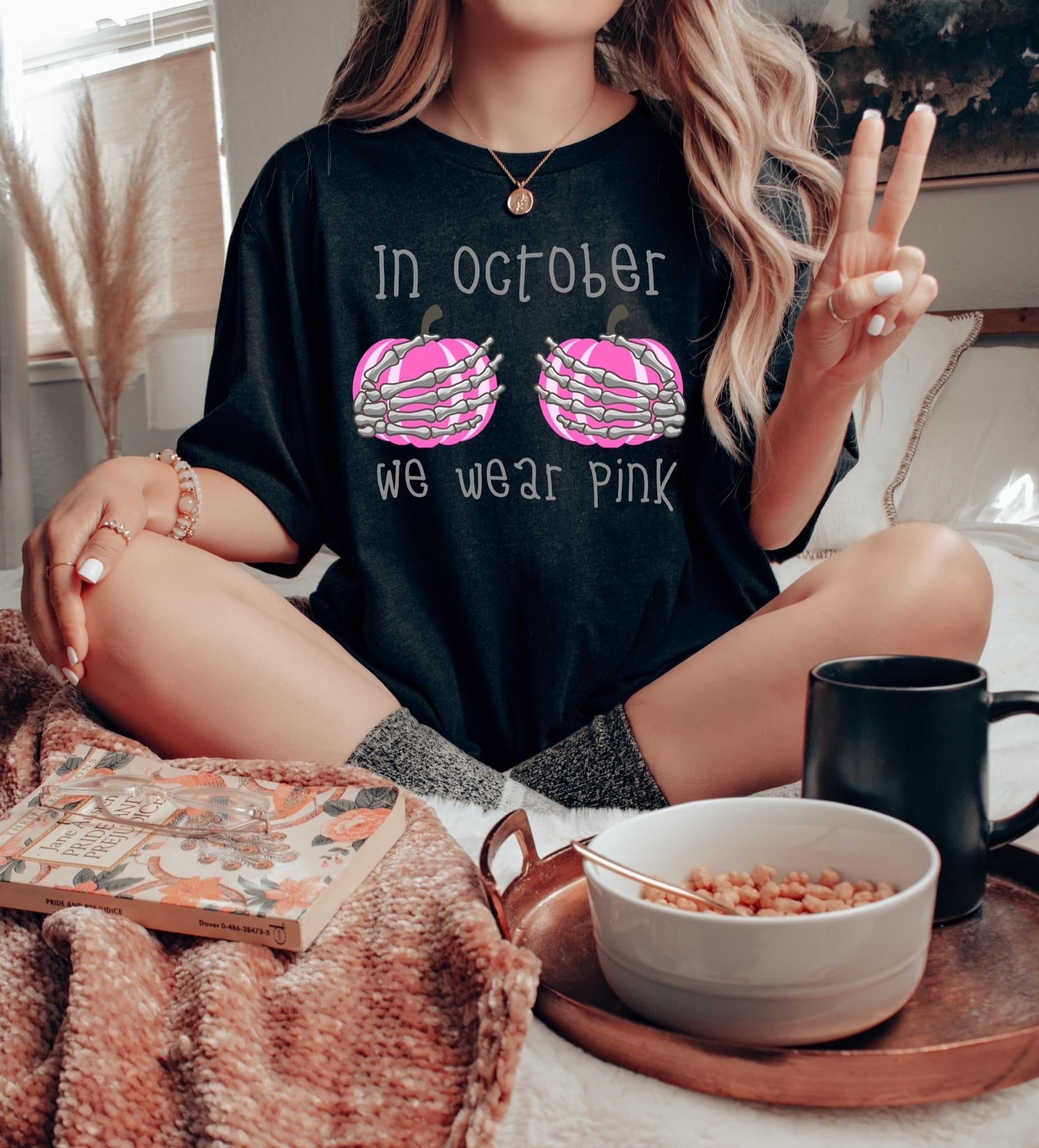 in october pink pumpkins and skeleton hands